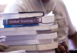Photograph of a stack of textbooks